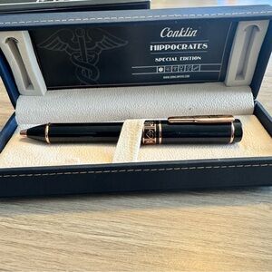 Conklin Hippocrates Special Edition Rollerball Pen - Black with Rose Gold trim.